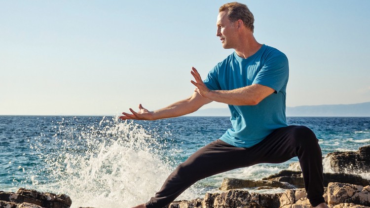 Lee Holden practicing Qi Gong outdoors